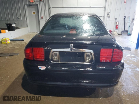 2002 Lincoln LS w/Base Pkg with VIN 1LNHM87A52Y714212, listed as a Copart auction lot 84810774 with 68,413 mi miles and Salvage Title. Bid and sale history available at DreamBid. Image 6.