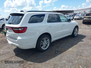 2023 Dodge Durango GT Plus with VIN 1C4RDJDG4PC688294, listed as a IAAI auction lot 42732273 with 63,384 mi miles and . Bid and sale history available at DreamBid. Image 4.