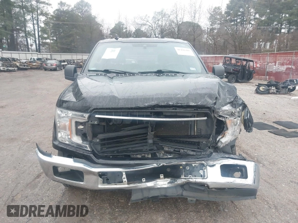 2019 Ford F-150 XL with VIN 1FTEW1C57KKD51657, listed as a IAAI auction lot 41426305 with 150,471 mi miles and . Bid and sale history available at DreamBid. Image 6.