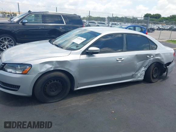 2014 Volkswagen Passat S with VIN 1VWAS7A38EC028292, listed as a IAAI auction lot 42357817 with 151,695 mi miles and . Bid and sale history available at DreamBid. Image 6.