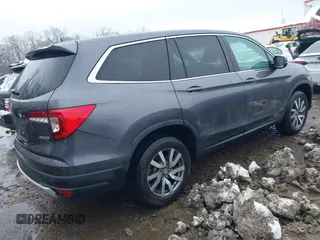 2021 Honda Pilot EX-L with VIN 5FNYF6H58MB102254, listed as a IAAI auction lot 41523287 with 27,029 mi miles. Bid and sale history available at carsss.com. Image 4.