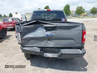 2018 Ford F-150 XL with VIN 1FTEW1EPXJFD25656, listed as a IAAI auction lot 42650683 with 119,326 mi miles and . Bid and sale history available at DreamBid. Image 16.