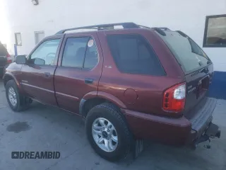 2002 Isuzu Rodeo S with VIN 4S2DM58W824313096, listed as a Copart auction lot 77951364 with 127,470 mi miles and Salvage Title. Bid and sale history available at DreamBid. Image 2.