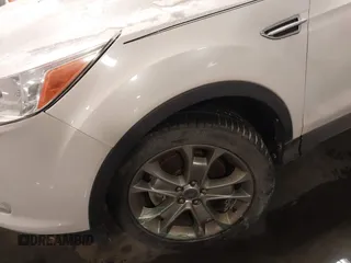 2013 Ford Escape SEL with VIN 1FMCU9HX0DUD85206, listed as a IAAI auction lot 41623110 with 99,223 mi miles. Bid and sale history available at carsss.com. Image 6.