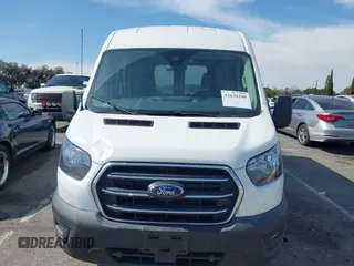 2020 Ford Transit Cargo z VIN 1FTBR1C83LKB11124, wystawiony jako IAAI lot #41634299 z przebiegiem 80 802 mil mil oraz . Historia ofert i sprzedaży dostępna na DreamBid. Obrazek 12.