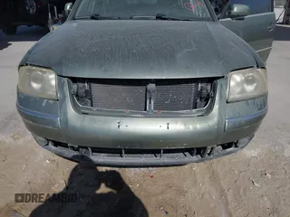 2004 Volkswagen Passat GLS z VIN WVWVD63BX4E011218, wystawiony jako IAAI lot #41308619 z przebiegiem 178 579 mil mil oraz . Historia ofert i sprzedaży dostępna na DreamBid. Obrazek 6.
