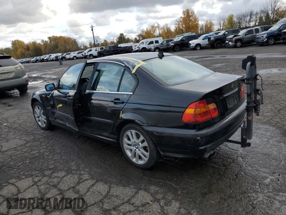 2002 BMW 3 Series 330xi with VIN WBAEW53482PG08312, listed as a Copart auction lot 80872734 with 180,306 mi miles and Salvage title. Bid and sale history available at DreamBid. Image 2.