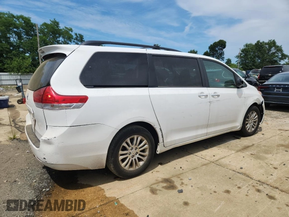 2011 Toyota Sienna XLE AAS с VIN 5TDYK3DC1BS017540, выставлен на аукционе Copart как лот 65177255 с пробегом 164 604 миль миль и Списание • Salvage title. История ставок и продаж доступна на DreamBid. Изображение 3.
