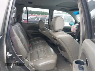 2006 Honda Pilot EX-L with VIN 5FNYF18776B011211, listed as a IAAI auction lot 39555749 with 295,998 mi miles and . Bid and sale history available at DreamBid. Image 8.