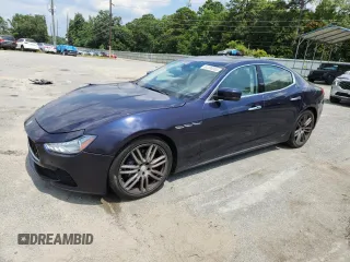 2014 Maserati Ghibli S Q4 with VIN ZAM57RTA3E1106434, listed as a Copart auction lot 62308365 with 68,626 mi miles and Salvage title. Bid and sale history available at DreamBid. Image 1.