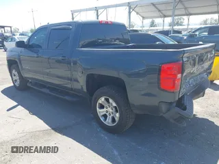 2018 Chevrolet Silverado 1500 LT with VIN 3GCUKREC1JG511846, listed as a IAAI auction lot 42024170 with 121,532 mi miles and . Bid and sale history available at DreamBid. Image 3.