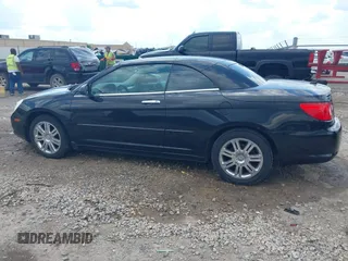 2008 Chrysler Sebring Limited z VIN 1C3LC65M38N197073, wystawiony jako IAAI lot #42142490 z przebiegiem 163 580 mil mil oraz . Historia ofert i sprzedaży dostępna na DreamBid. Obrazek 14.