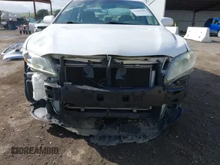 2009 Toyota Camry with VIN 4T1BE46K69U913065, listed as a IAAI auction lot 41906304 with 153,018 mi miles. Bid and sale history available at carsss.com. Image 6.