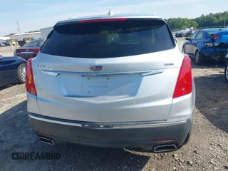2017 Cadillac XT5 Luxury FWD z VIN 1GYKNBRS3HZ223077, wystawiony jako IAAI lot #42091584 z przebiegiem 154 664 mil mil oraz . Historia ofert i sprzedaży dostępna na DreamBid. Obrazek 16.
