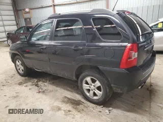 2009 Kia Sportage LX with VIN KNDJF724597564338, listed as a Copart auction lot 44123195 with 113,132 mi miles and Salvage Title. Bid and sale history available at carsss.com. Image 2.