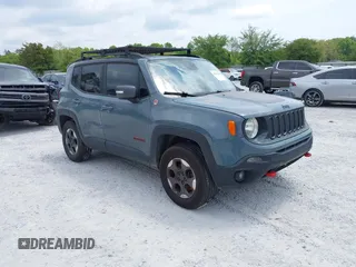 2017 Jeep Renegade Deserthawk z VIN ZACCJBCBXHPF82004, wystawiony jako IAAI lot #42027598 z przebiegiem Nie podano mil oraz . Historia ofert i sprzedaży dostępna na DreamBid. Obrazek 1.