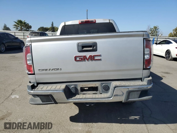 2019 GMC Canyon 2WD with VIN 1GTG5BEA1K1187730, listed as a Copart auction lot 77420574 with 103,127 mi miles and Salvage Title. Bid and sale history available at carsss.com. Image 6.