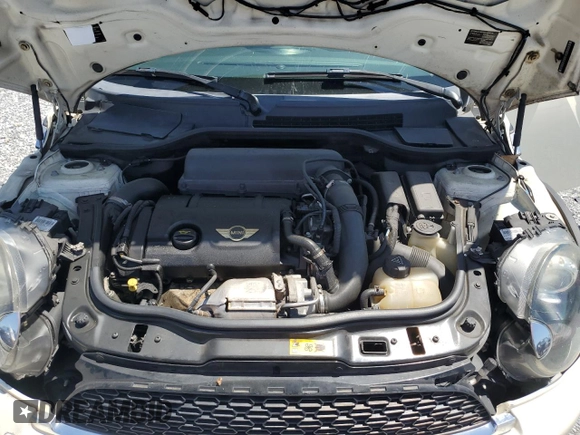 2014 MINI Clubman S z VIN WMWZG3C50ET801008, wystawiony jako Copart lot #57430295 z przebiegiem 145 264 mil mil oraz Szkoda całkowita • Salvage title. Historia ofert i sprzedaży dostępna na DreamBid. Obrazek 11.