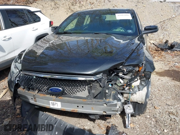 2014 Ford Taurus SHO with VIN 1FAHP2KT8EG131067, listed as a IAAI auction lot 42102086 with 107,822 mi miles. Bid and sale history available at carsss.com. Image 12.