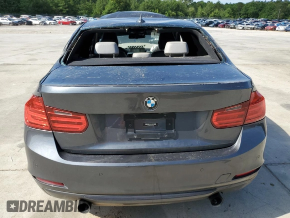 2012 BMW 3 Series 335i with VIN WBA3A9C5XCF474803, listed as a Copart auction lot 57940675 with 121,960 mi miles and Salvage title. Bid and sale history available at DreamBid. Image 6.