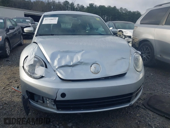 2016 Volkswagen Beetle SE с VIN 3VWJ17AT3GM606917, выставлен на аукционе IAAI как лот 41728053 с пробегом Не указан миль и . История ставок и продаж доступна на DreamBid. Изображение 6.