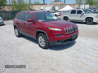 2014 Jeep Cherokee Altitude with VIN 1C4PJMCB7EW185958, listed as a IAAI auction lot 42002583 with 118,256 mi miles and . Bid and sale history available at DreamBid. Image 1.
