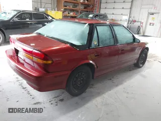 1995 Saturn SL with VIN 1G8ZK5279SZ125208, listed as a IAAI auction lot 42525746 with 111,338 mi miles and . Bid and sale history available at DreamBid. Image 4.