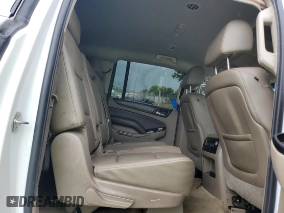 2015 Chevrolet Suburban LT with VIN 1GNSCJKC7FR203718, listed as a Copart auction lot 59577225 with Not provided miles and Salvage title. Bid and sale history available at DreamBid. Image 11.