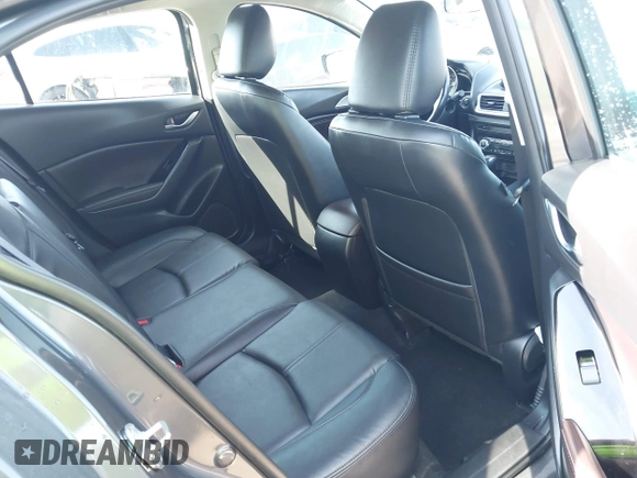 2017 Mazda 3 Touring with VIN 3MZBN1L70HM102817, listed as a IAAI auction lot 41867063 with 100,307 mi miles and . Bid and sale history available at DreamBid. Image 8.