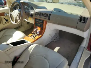 1999 Mercedes-Benz SL-Class with VIN WDBFA68F3XF184908, listed as a Copart auction lot 77165784 with 67,408 mi miles and Salvage Title. Bid and sale history available at carsss.com. Image 8.