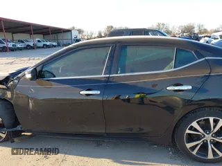 2016 Nissan Maxima Platinum z VIN 1N4AA6AP6GC430470, wystawiony jako IAAI lot #41390041 z przebiegiem 86 483 mil mil oraz . Historia ofert i sprzedaży dostępna na DreamBid. Obrazek 15.