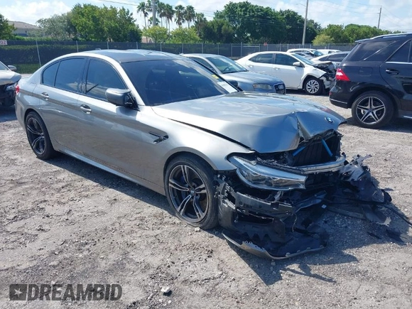 2019 BMW M5 Competition z VIN WBSJF0C50KB285924, wystawiony jako IAAI lot #41686677 z przebiegiem 44 238 mil mil oraz . Historia ofert i sprzedaży dostępna na DreamBid. Obrazek 1.