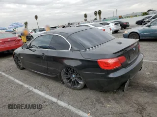 2011 BMW 3 Series 335i with VIN WBADX7C59BE743322, listed as a Copart auction lot 84219074 with 94,623 mi miles and Salvage Title. Bid and sale history available at carsss.com. Image 2.