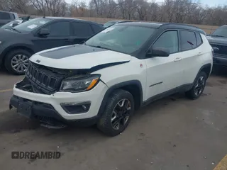 2018 Jeep Compass Trailhawk with VIN 3C4NJDDB9JT174899, listed as a IAAI auction lot 41635784 with 124,656 mi miles and . Bid and sale history available at DreamBid. Image 16.