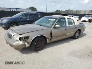 2002 Mercury Grand Marquis GS z VIN 2MEFM74W02X647670, wystawiony jako Copart lot #60031435 z przebiegiem 142 698 mil mil oraz Szkoda całkowita • Salvage title. Historia ofert i sprzedaży dostępna na DreamBid. Obrazek 1.