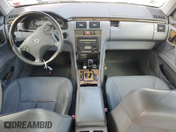 2002 Mercedes-Benz E-Class with VIN WDBJF65J02B495961, listed as a Copart auction lot 73844554 with 99,380 mi miles and Salvage Title. Bid and sale history available at carsss.com. Image 8.