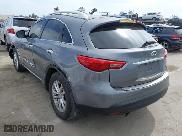 2014 Infiniti QX70 with VIN JN8CS1MU8EM450428, listed as a IAAI auction lot 42233727 with 88,342 mi miles and . Bid and sale history available at DreamBid. Image 3.