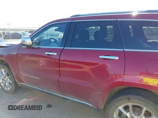 2015 Jeep Grand Cherokee Summit with VIN 1C4RJEJG9FC100568, listed as a IAAI auction lot 42512705 with 128,413 mi miles and . Bid and sale history available at DreamBid. Image 14.