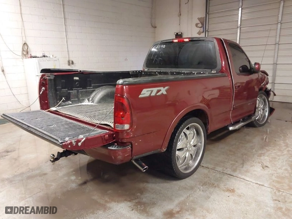 2003 Ford F-150 Heritage XL with VIN 2FTRF17243CA88390, listed as a IAAI auction lot 41387248 with 1 mi miles. Bid and sale history available at carsss.com. Image 4.