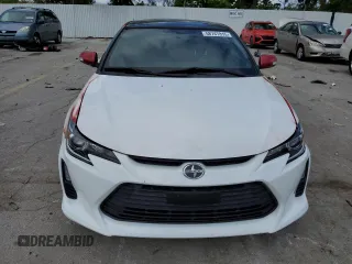 2016 Scion tC z VIN JTKJF5C79GJ025565, wystawiony jako Copart lot #58747815 z przebiegiem 89 174 mil mil oraz Szkody całkowita. Historia ofert i sprzedaży dostępna na DreamBid. Obrazek 5.