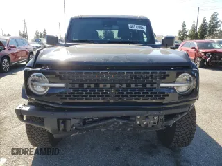 2024 Ford Bronco Wildtrak z VIN 1FMEE2BP1RLA54539, wystawiony jako Copart lot #46310905 z przebiegiem 12 545 mil mil oraz Szkody całkowita. Historia ofert i sprzedaży dostępna na DreamBid. Obrazek 5.