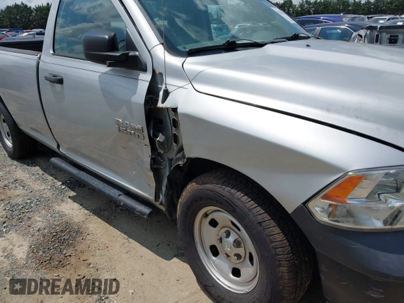 2018 Ram 1500 Tradesman with VIN 3C6JR6DG8JG129127, listed as a IAAI auction lot 42540299 with 117,414 mi miles and . Bid and sale history available at DreamBid. Image 6.