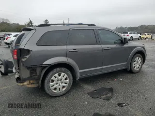 2018 Dodge Journey SE with VIN 3C4PDCAB6JT517988, listed as a Copart auction lot 48103275 with 129,897 mi miles and Salvage Title. Bid and sale history available at DreamBid. Image 3.
