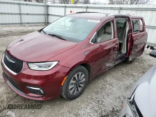 2021 Chrysler Pacifica Hybrid Touring L with VIN 2C4RC1L74MR602943, listed as a Copart auction lot 48244145 with 72,144 mi miles and Salvage title. Bid and sale history available at DreamBid. Image 1.
