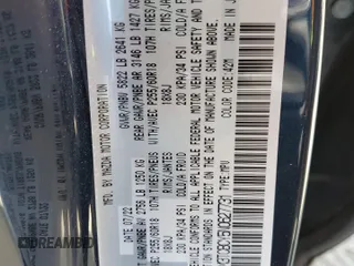 2022 Mazda CX-9 Touring z VIN JM3TCBCY5N0627731, wystawiony jako Copart lot #52804985 z przebiegiem 24 425 mil mil oraz Szkoda całkowita • Salvage title. Historia ofert i sprzedaży dostępna na DreamBid. Obrazek 13.