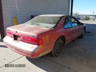 1997 Ford Thunderbird LX with VIN 1FALP6247VH138208, listed as a IAAI auction lot 41562980 with 135,204 mi miles and . Bid and sale history available at DreamBid. Image 4.