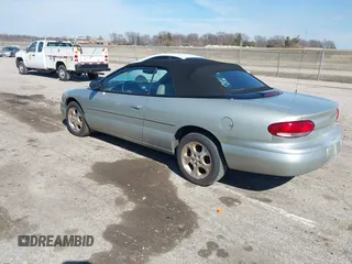 1999 Chrysler Sebring JXi z VIN 3C3EL55H6XT603058, wystawiony jako IAAI lot #41774322 z przebiegiem 157 852 mil mil oraz . Historia ofert i sprzedaży dostępna na DreamBid. Obrazek 3.