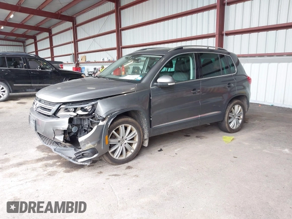 2016 Volkswagen Tiguan SE with VIN WVGBV7AX7GW526904, listed as a IAAI auction lot 42590816 with 73,758 mi miles and . Bid and sale history available at DreamBid. Image 2.