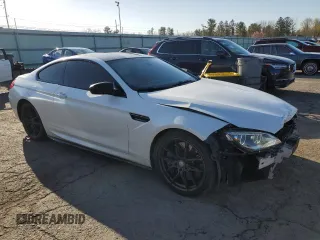 2015 BMW M6 z VIN WBSLX9C51FD160757, wystawiony jako Copart lot #51991315 z przebiegiem 71 133 mil mil oraz Szkody całkowita. Historia ofert i sprzedaży dostępna na DreamBid. Obrazek 4.