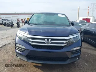 2018 Honda Pilot EX-L with VIN 5FNYF6H57JB026036, listed as a IAAI auction lot 42000454 with 110,996 mi miles and . Bid and sale history available at DreamBid. Image 6.